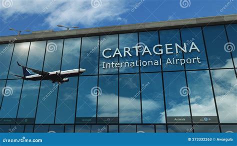 Airplane Landing at Cartagena Airport Mirrored in Terminal Stock ...