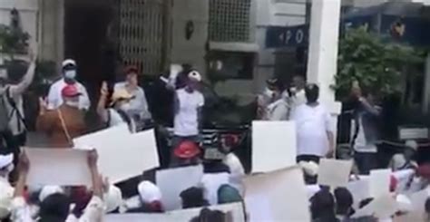 Yangon residents stage a protest in front of the Indian Embassy on ...