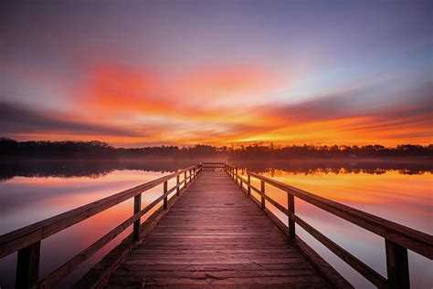 Bright Sunrise With Fog Rolling In Photograph by Jordan Hill