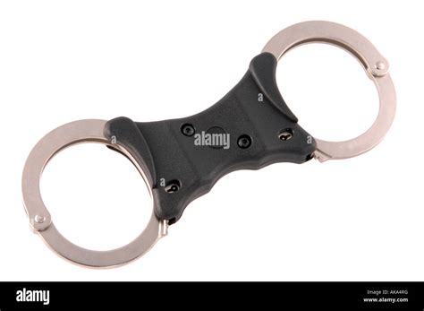 modern UK police handcuffs isolated on white Stock Photo - Alamy