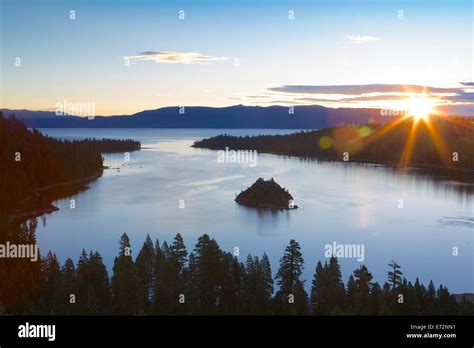 A gorgeous sunrise on a calm morning at Emerald Bay State Park in Lake Tahoe, California Stock ...