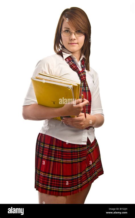 Teenage girl in American style school uniform against white background ...