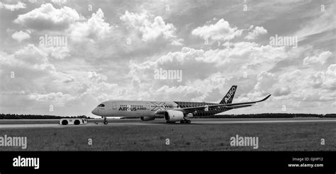 The newest Airbus A350 XWB at the airfield. Black and white. Exhibition ILA Berlin Air Show 2016 ...