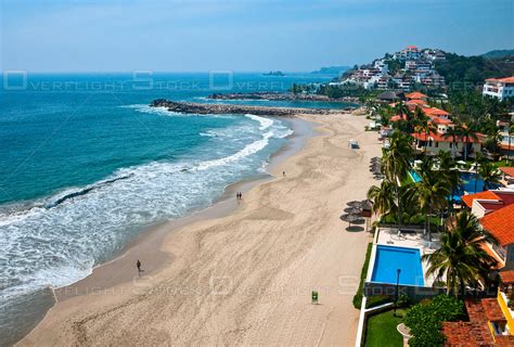 OverflightStock™ | The beach looking north. Playa El Palmar, Ixtapa, Mexico. Aerial Stock Photo