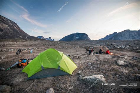 Auyuittuq national park hiking scene — journey, Carrying - Stock Photo | #415993942