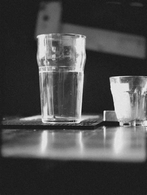 Grayscale Photo of Two Clear Drinking Glasses · Free Stock Photo