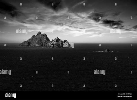 Two rocky islands in the sea at sunset, Skellig Michael and Little Skellig, Skellig Ring ...