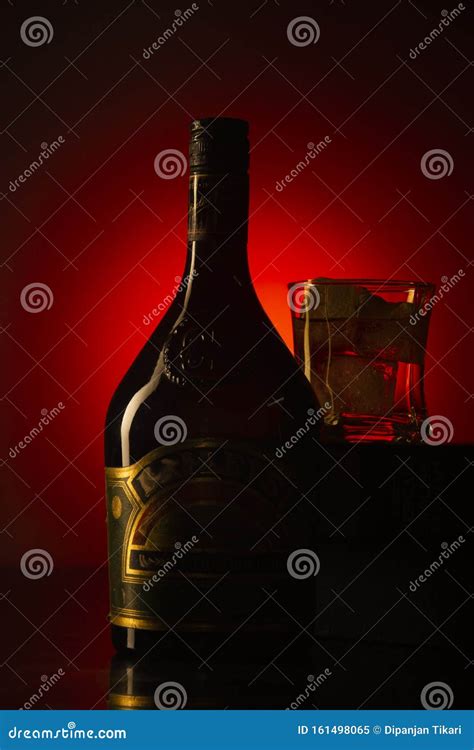 A Glass and a Bottle of Whiskey Wallpaper in HD Stock Image - Image of alcohol, gold: 161498065