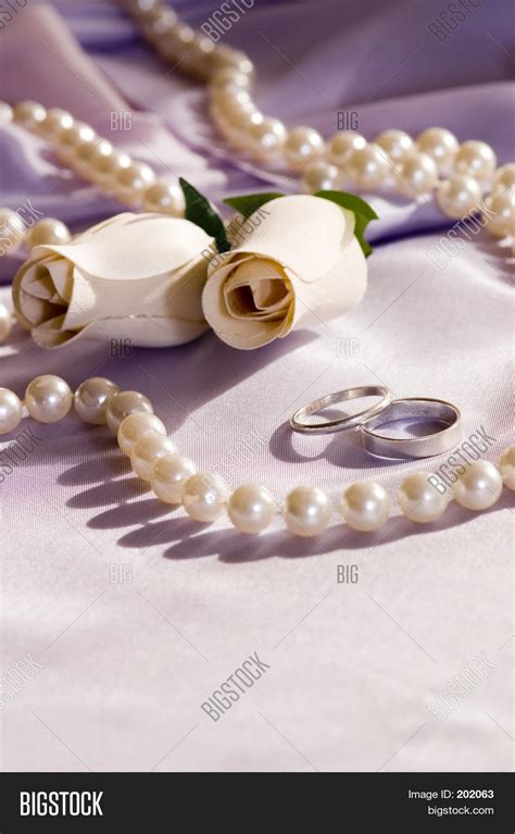 Wedding Rings Roses Image & Photo (Free Trial) | Bigstock