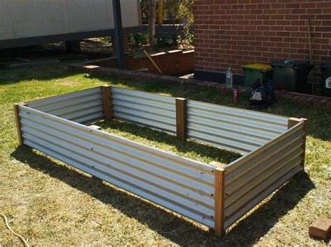 Pin by Kim Thompson on Gardening | Corrugated garden beds, Raised ...