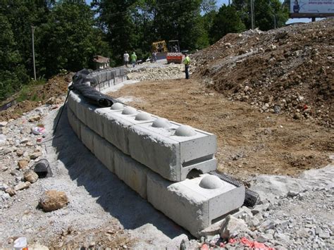 Redi-Rock Retaining Wall with Geo Grid during Installation - SI Precast ...