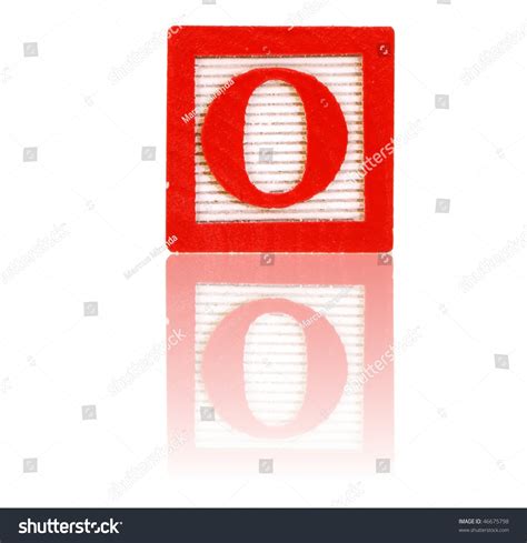 Letter O In An Alphabet Wood Block On A Reflective Surface Stock Photo ...