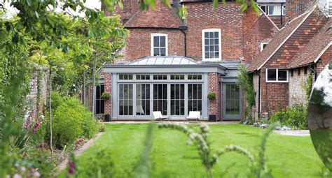Home living space extended with an open plan orangery