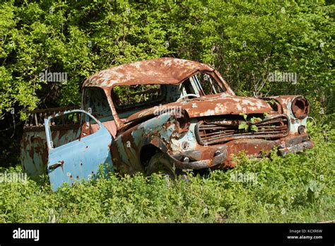 old rusty car at garden Stock Photo - Alamy