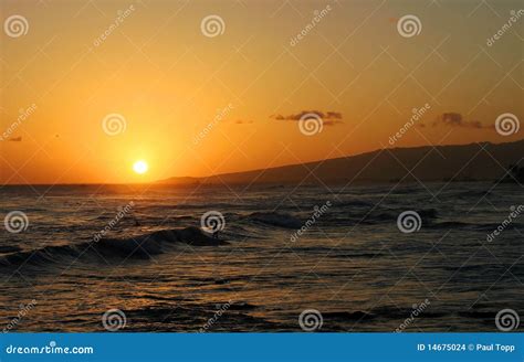 Surfer Surfing during a Hawaiian Sunset Stock Photo - Image of solar, sunrise: 14675024