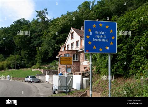 St. Germanshof town sign and national border between France and Germany Stock Photo - Alamy