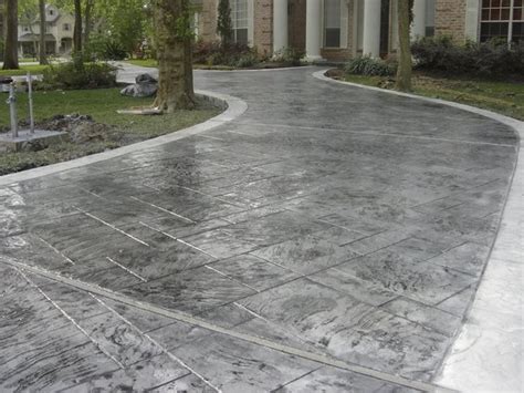 Concrete driveway pavers vs stamped concrete driveway