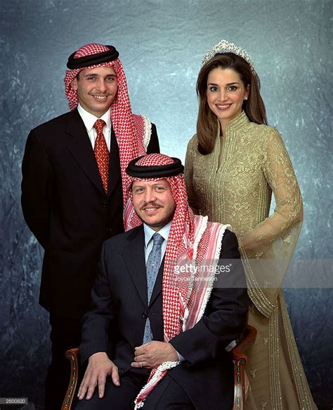 King of Jordan Abdullah II poses with his wife, Queen Rania and his ...