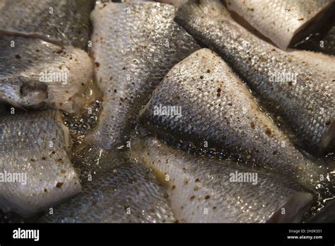 Cooking fish, deep fried fishes in hot oil in a frying pan Stock Photo ...