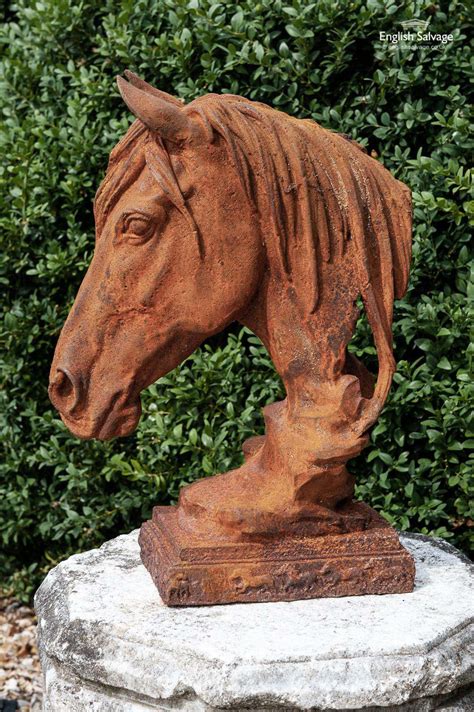 Pair of large horse head cast iron statues