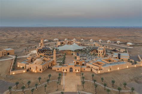 an aerial view of a large building in the desert