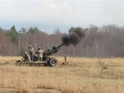 105mm round just out of m119 howitzer tube : army