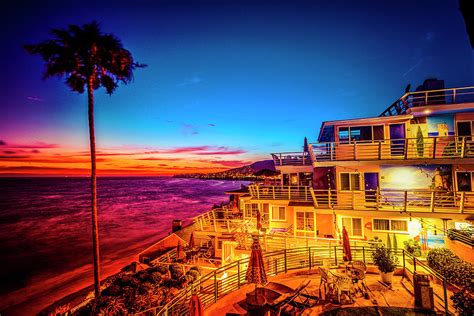 Twilight Laguna Riviera Beach Resort Photograph by Amyn Nasser | Fine Art America