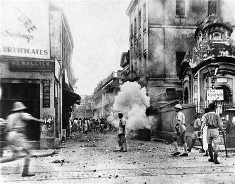 Calcutta Police Use Tear Gas Bombs during an Attempt to Set Fire to a ...