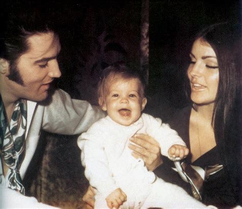 Elvis presley with his wife priscilla and daughter lisa marie 1969 ...