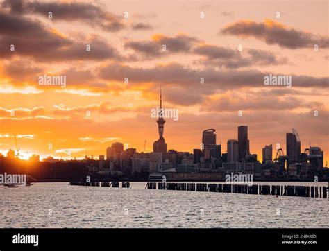 A sunset view of the cityscape of Auckland's Central Business District ...