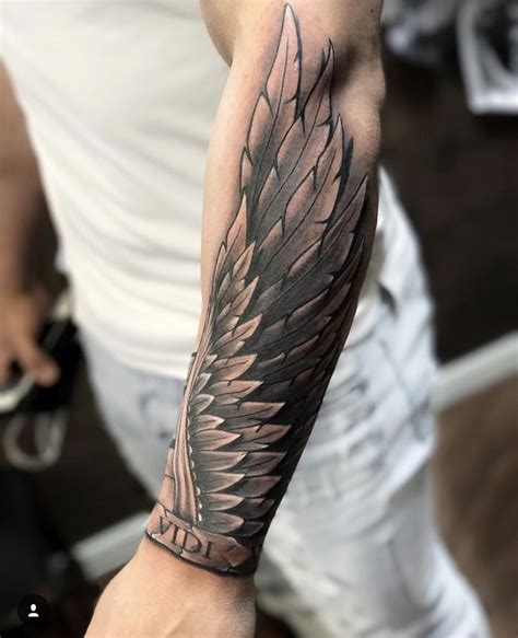 Pin by Murat Tunca on Tattoo | Wing tattoo men, Forearm band tattoos, Forearm tattoo men