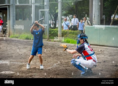 Kids playing baseball in a park in Tokyo, Japan Stock Photo - Alamy