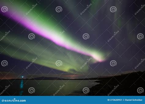 Bright Pink Aurora Borealis Over Ocen, Grotta Lighthouse Iceland Stock ...