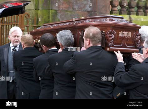 Neil Lennon acts as a pall bearer The funeral of Paul McBride QC, held at St Aloysius' Church in ...