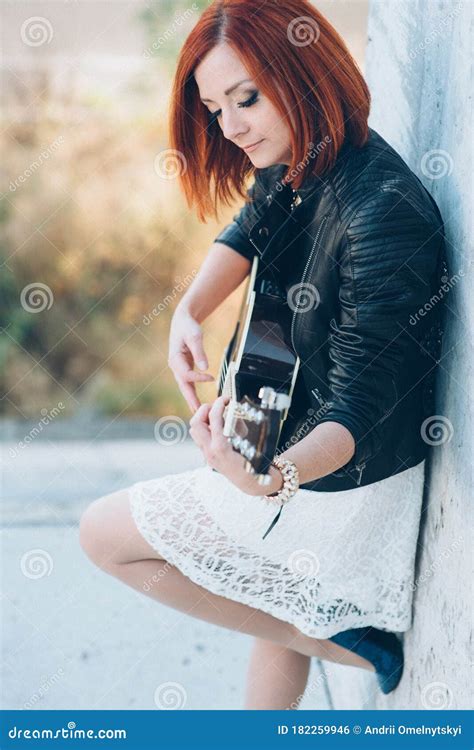 Young Girl with Red Hair with an Acoustic Guitar Stock Photo - Image of ...