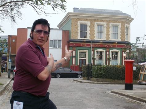 Paul Richie on the set of BBC TV's Eastenders in front of the Queen Vic pub