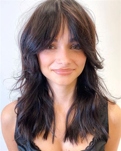 Wolf Cuts: The Hottest Haircut Trend | Long hair cuts, How to cut bangs, Long hair with bangs