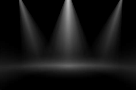 Free Vector | Black background with three focus stage lights effect