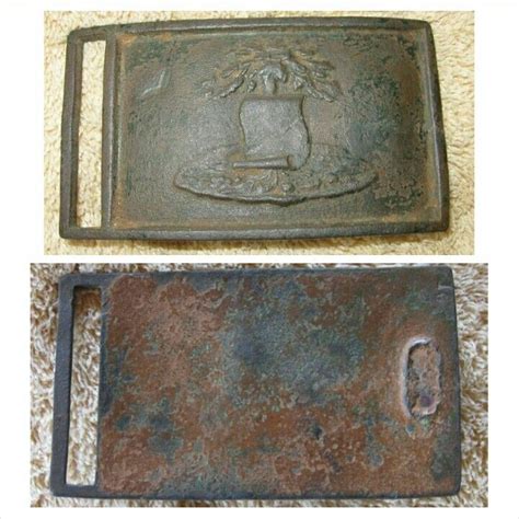 Alabama sword belt plate, state seal "map on tree". Buckle depicts the state seal of Alabama, a ...