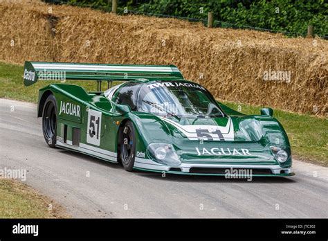 1985 Jaguar XJR-6 Group C Le Mans endurance racer with driver Henry Pearman at the 2017 Goodwood ...