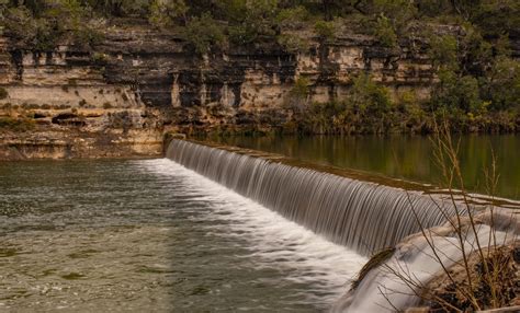 What Should You Do When Approaching A Low Head Dam In A Kayak?