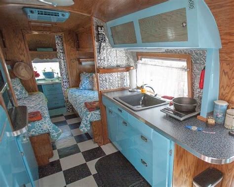 Vintage camper. Love the interior - even painted the air unit - which is pretty cool ...