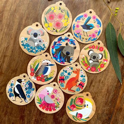 twelve australian wooden ornaments with koalas, kangaroos and other ...