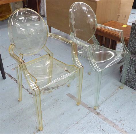 KARTELL LOUIS GHOST CHAIRS, a set of seven, by Philippe Starke, four in a green tint, the other ...
