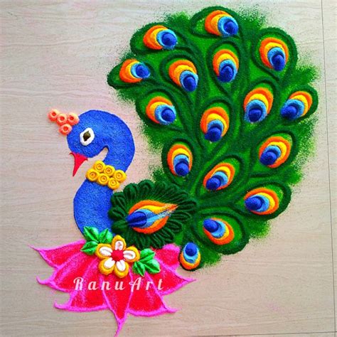 Peacock rangoli designs by Ranuart | Free hand rangoli design, Peacock rangoli, Simple rangoli ...