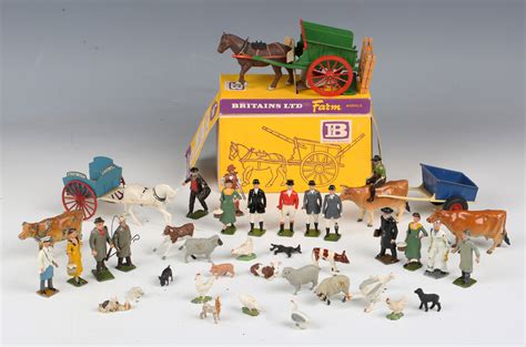 A collection of Britains farm series lead figures and accessories ...