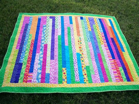 You probably recognize this quilt as one of those 1600 jelly roll challenge quilts. I made it ...