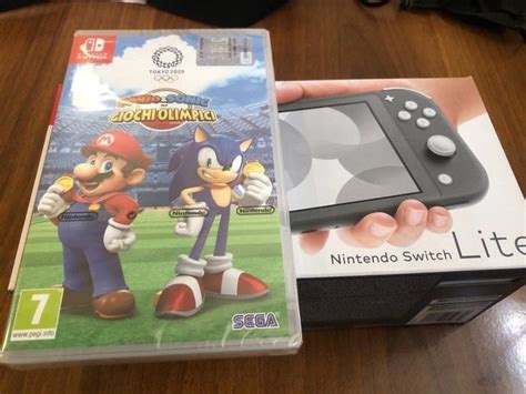 1 Nintendo switch lite grey - Console with games (1) - In - Catawiki