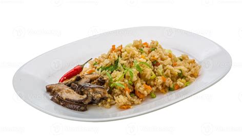 Fried rice with mushrooms 8472103 Stock Photo at Vecteezy