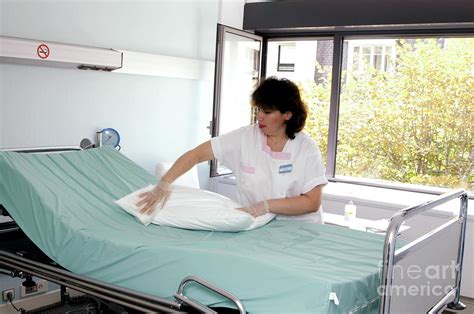 Cleaning Hospital Bed #2 Photograph by Aj Photo/hop Americain/science ...